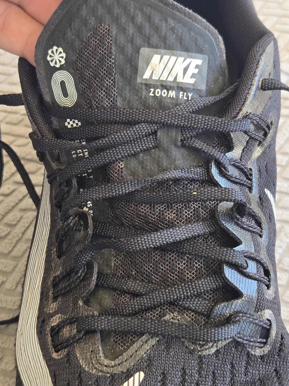 Nike Men’s Black Running Shoes with White Swoosh